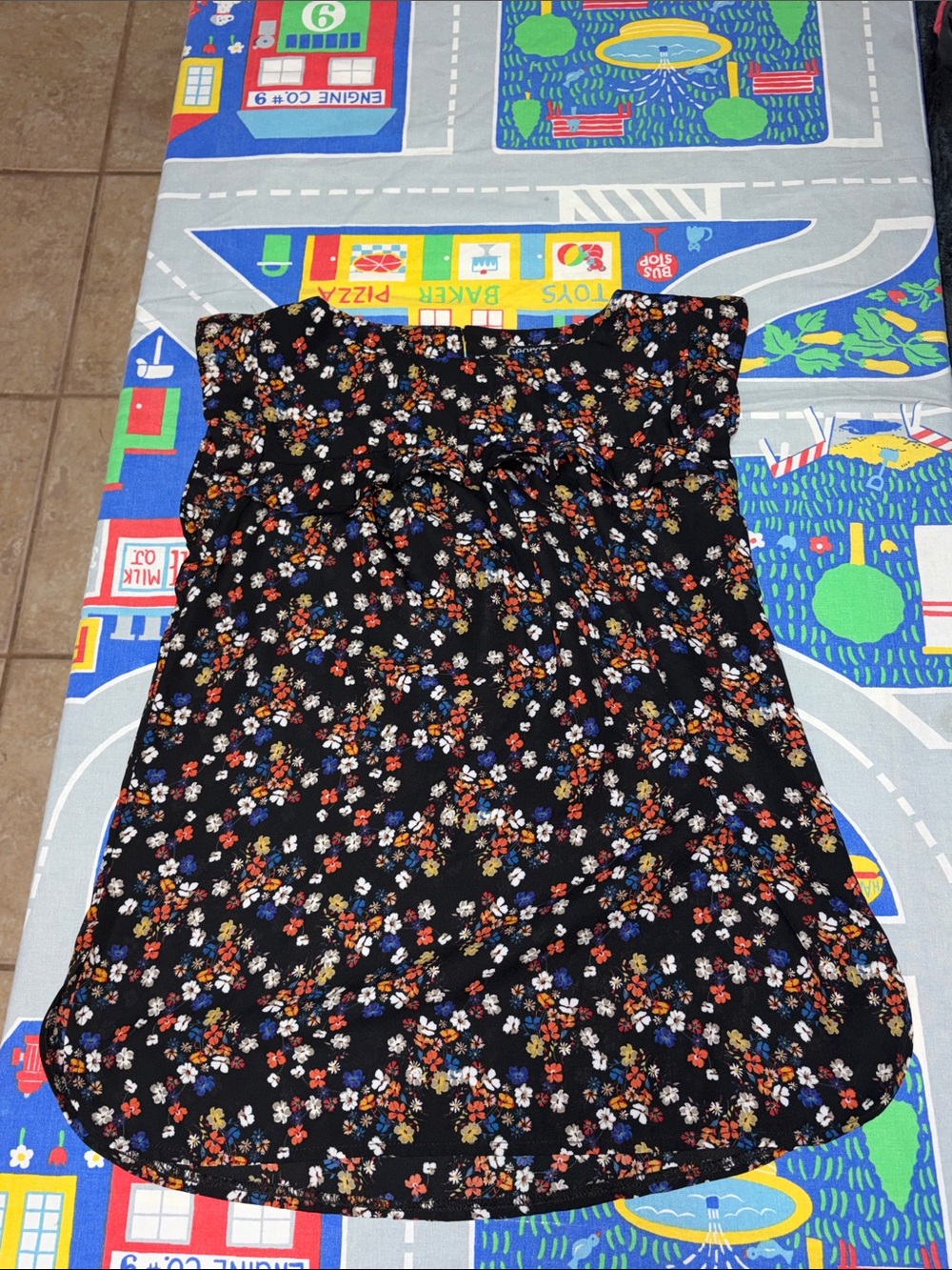 Black floral sleeveless blouse